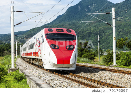 Tze-Chiang Limited Express(Puyuma) train through the beautiful countryside of Hualien, Taiwan Tze-Chiang Limited Express(Puyuma) train through the beautiful countryside of Hualien, Taiwan 79176097