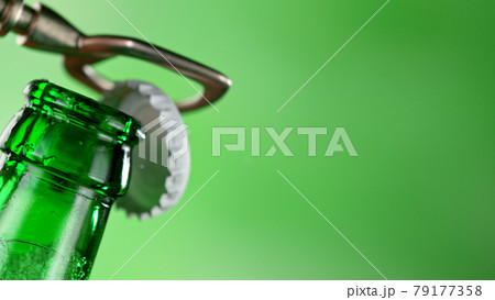 Freeze motion of opening beer bottle. Freeze motion of opening beer bottle. 79177358