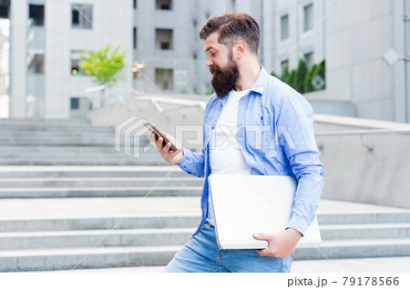 Got SMS. Bearded man read SMS in mobile phone. Got SMS. Bearded man read SMS in mobile phone. 79178566