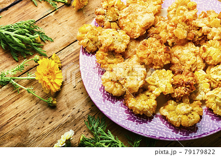 Chrysanthemum flowers in batter 79179822