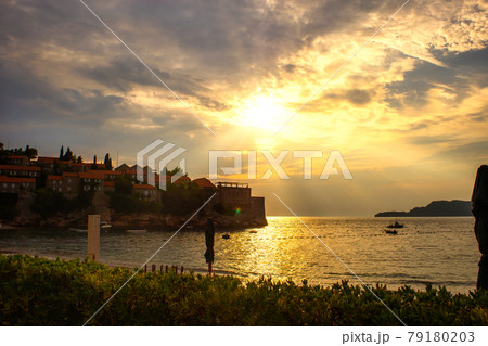 Sunset over Sveti Stefan islet in Montenegro 79180203