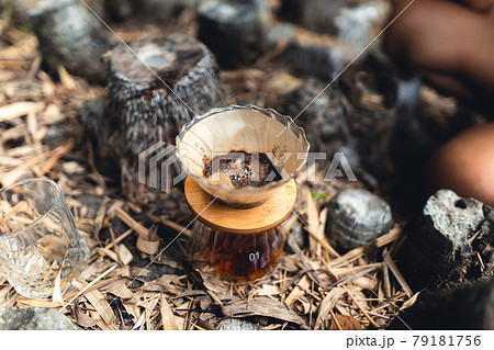 Drip coffee in the forest,pour hot water in coffee 79181756