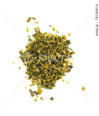 Dried green paprika flakes with seeds isolated on white background. Chopped jalapeno, habanero or chilli pepper. Spices and herbs. Top view. 79189614