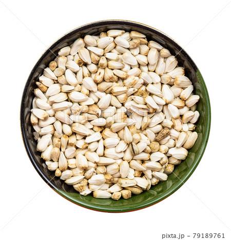 safflower seeds in round bowl isolated 79189761