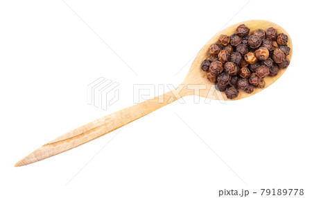 top view of red kampot pepper in wood spoon 79189778