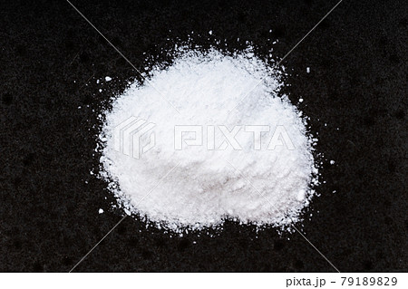 pile of vanillin powder close up on black pile of vanillin powder close up on black 79189829