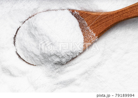 top view of wood spoon with dextrose sugar closeup top view of wood spoon with dextrose sugar closeup 79189994