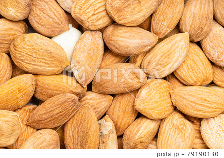 background - many raw apricot kernels 79190130