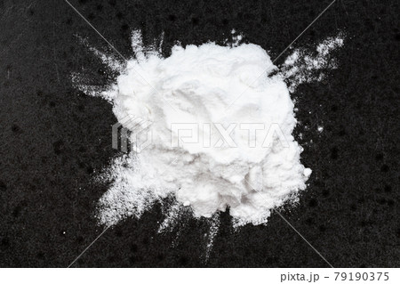 top view of pile of potato starch closeup on black 79190375