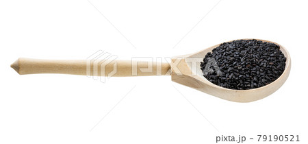 wooden spoon with black sesame seeds isolated 79190521