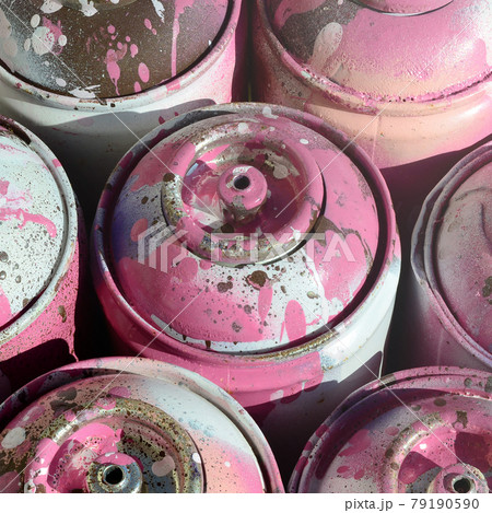 A lot of used pink metal tanks with paint for drawing graffiti 79190590