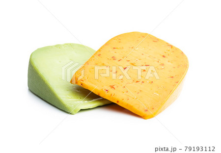 Block of hard cheese with chili and wasabi flavor. Block of hard cheese with chili and wasabi flavor. 79193112