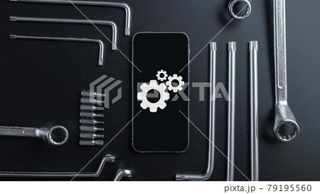 Mobile repair service. Technician workplace with phone and special repairing tools. Electronics repair service, device production concept. 79195560