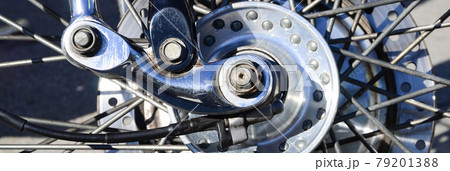 Fragment of chromed shiny wheel of old classic motorbike Fragment of chromed shiny wheel of old classic motorbike 79201388