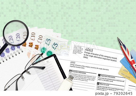 English form AD03 Change of location of the company records to the single alternative inspection location SAIL from Companies House service lies on table with office items 79202645