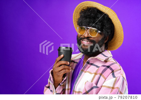 Portrait of smiling young black man in studio 79207810
