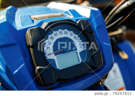 Close-up details of cross motorcycle parked on ground 79207812