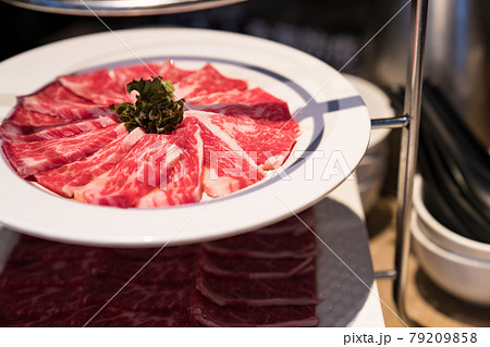 Raw beef in Japanese restaurant. This restaurant specializes in grilled meat. 79209858