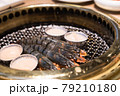 Japanese barbecue restaurant. Shrimp and scallops are heated on the grilled net. 79210180