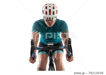 Young professional female bike rider on road bike isolated over white background. 79213036