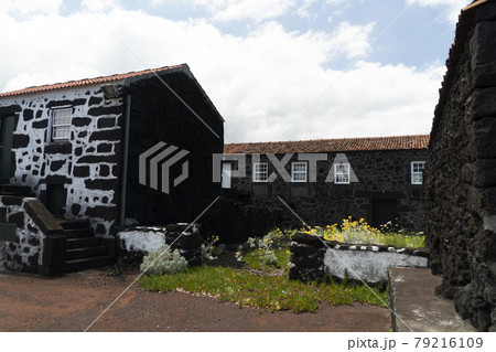 Lajido village Pico Island Azores black lava houses red windows 79216109