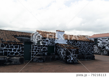 Lajido village Pico Island Azores black lava houses red windows 79216113