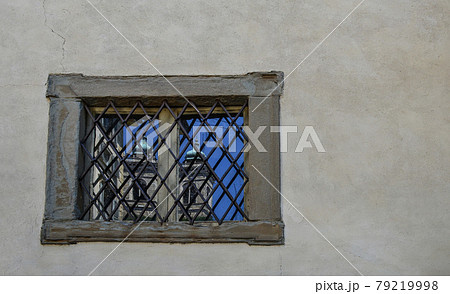 Window with church reflection in Bergamo, Upper City, famous tourist destination in Lombardy, Italy. Window with church reflection in Bergamo, Upper City, famous tourist destination in Lombardy, Italy. 79219998