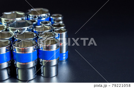 Block wrench set on a black background. 79221058