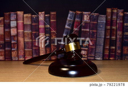 Judge hammer on wooden table. Justice concept in courtroom. Mallet of judge on law theme Judge hammer on wooden table. Justice concept in courtroom. Mallet of judge on law theme 79221978