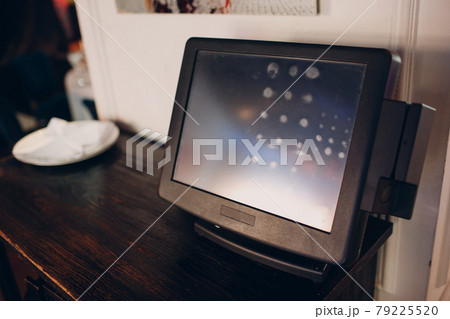 waiter cash register monitor with fingerprints From frequent use restaurant business concept waiter cash register monitor with fingerprints From frequent use restaurant business concept 79225520