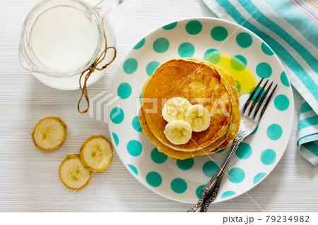 Traditional American banana pancakes, top view. Traditional American banana pancakes, top view. 79234982