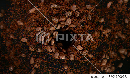 Rotating Coffee Beans on Black Background. Rotating Coffee Beans on Black Background. 79240098