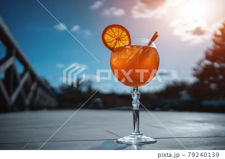 close up of fresh orange aperol spritz mango cocktail with ice in glass outdoor close up of fresh orange aperol spritz mango cocktail with ice in glass outdoor 79240139