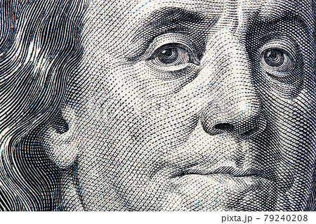 Benjamin Franklin portrait close-up on 100 dollars banknote 79240208