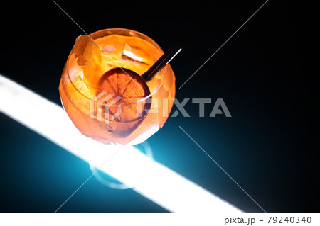 fresh orange aperol spritz mango cocktail with ice in glass on black background fresh orange aperol spritz mango cocktail with ice in glass on black background 79240340