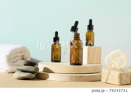 Minimal modern cosmetic products with natural cosmetics on neutral beige background with shadow overlay Minimal modern cosmetic products with natural cosmetics on neutral beige background with shadow overlay 79243731