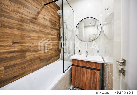 Interior of small bathroom in minimalist style. Interior of small bathroom in minimalist style. 79245352