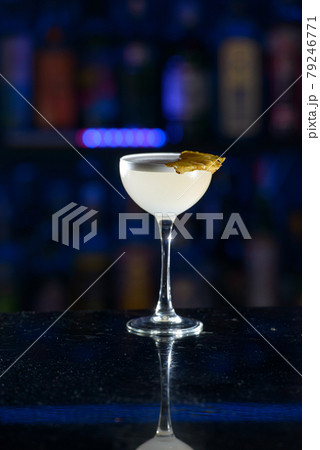 yellow refreshing coctail on a bar desk yellow refreshing coctail on a bar desk 79246771