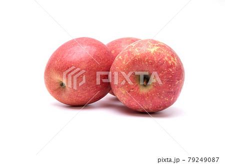Fuji apples isolated on white background. Healthy food concept Fuji apples isolated on white background. Healthy food concept 79249087