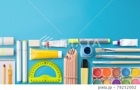 Flat lay top view of group of school supplies, back to school concept. Copy space. Flat lay top view of group of school supplies, back to school concept. Copy space. 79252002