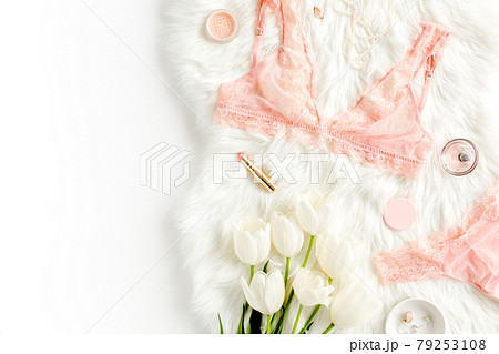 Flat lay set of sexy, lacy, pink lingerie, accessories on white background. Top view. Flat lay set of sexy, lacy, pink lingerie, accessories on white background. Top view. 79253108