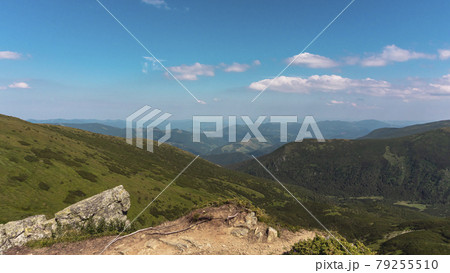 Amazing mountain landscape with blue sky with white clouds, sunny summer day in Carpathians, Ukraine 79255510