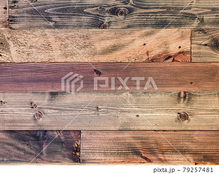 Old brown vintage wooden planks wall vintage texture abstract for background for design and decoration. Wood material backdrop for Vintage wallpaper. Reclaimed wood background. Old brown vintage wooden planks wall vintage texture abstract for background for design and decoration. Wood material backdrop for Vintage wallpaper. Reclaimed wood background. 79257481