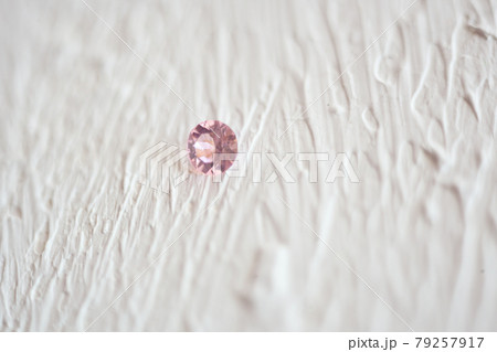 Pink Crystal Stone macro, pink transparent rough quartz crystals Pink Crystal Stone macro, pink transparent rough quartz crystals 79257917