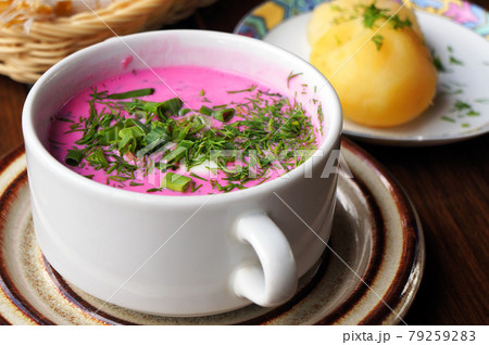 Cold beetroot soup with greens and hot potatoes. Selective focus. 79259283