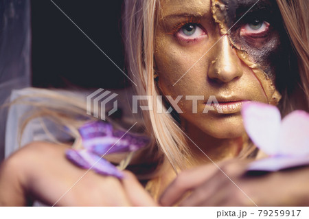 fashion beautiful young woman surrounded by butterflies. 79259917