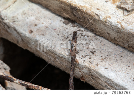 Concrete blocks and rusty fittings. Safety and the environment Concrete blocks and rusty fittings. Safety and the environment 79262768