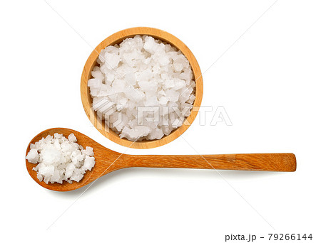 Salt in wood spoon on white background Salt in wood spoon on white background 79266144
