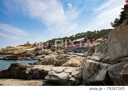 Haedong Yonggungsa Temple sits upon a cliff overlooking the East Sea in Busan, South Korea. Haedong Yonggungsa Temple sits upon a cliff overlooking the East Sea in Busan, South Korea. 79267265