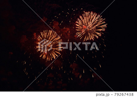 Blurred multicolored fireworks lights against the dark night sky 79267438